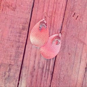 Pink leather earrings.